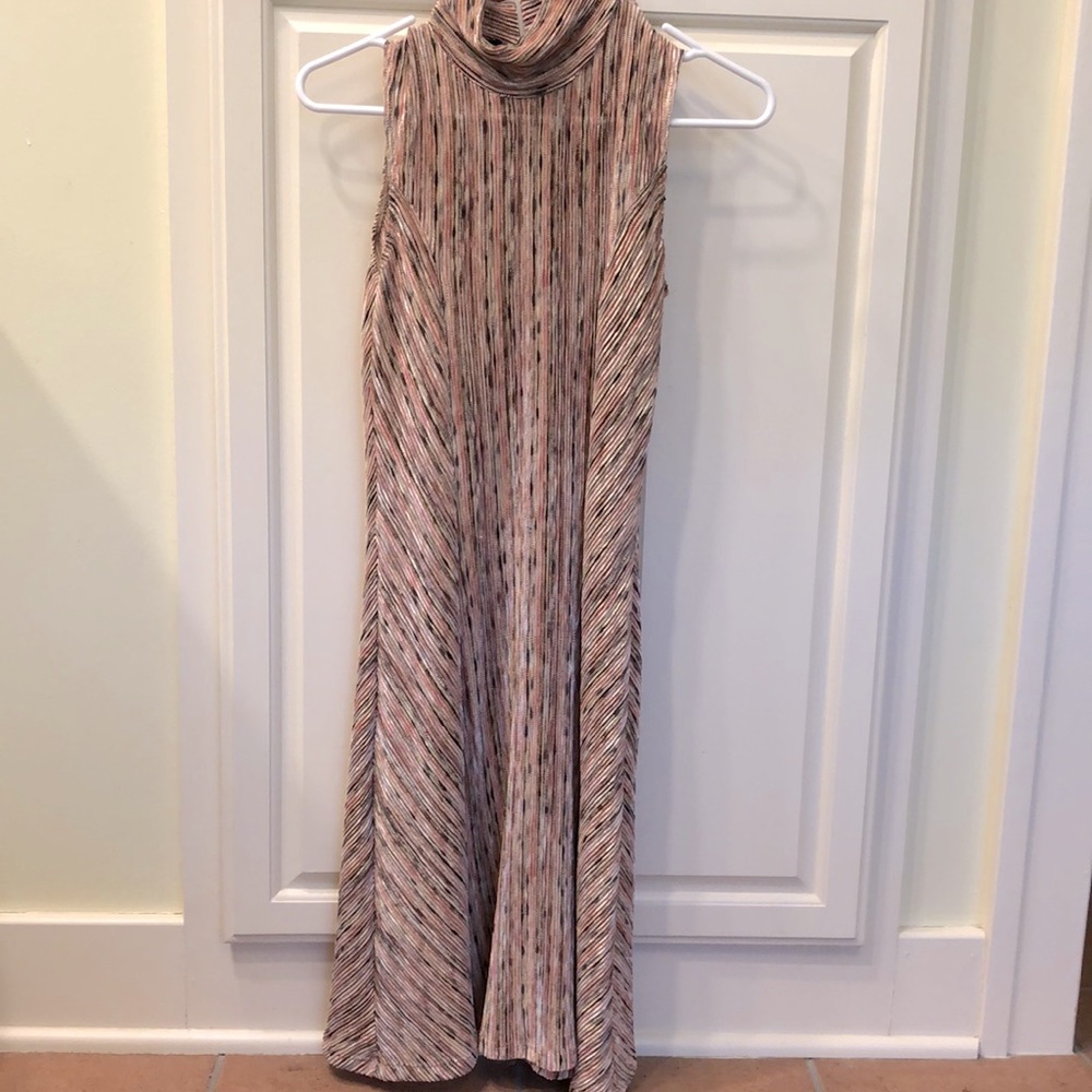 Woman’s stripped dress with high neck